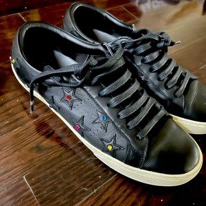 Saint Laurent rhinestone star sneakers.